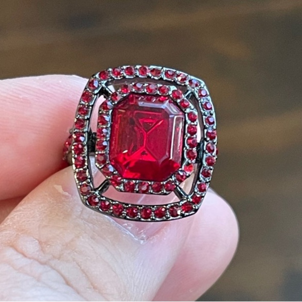 Givenchy Red Crystal
Ring in gunmetal setting. Size 6.75
